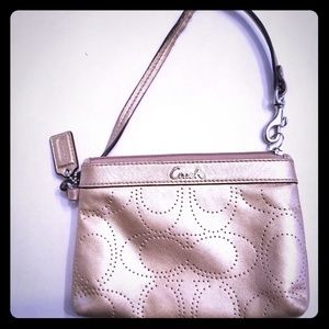 Coach Perforated signature C Metalic Gold Wristlet